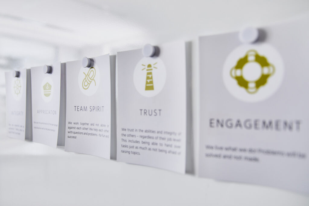 Values pinned on a white board. 